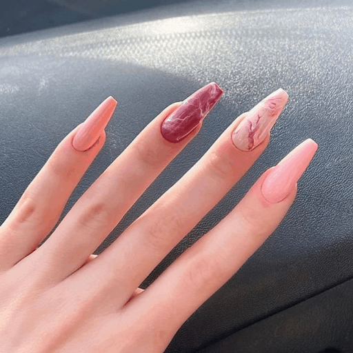 Pink nails examples, the trendiest pink nail colors to use: Multi-Colored Marble
