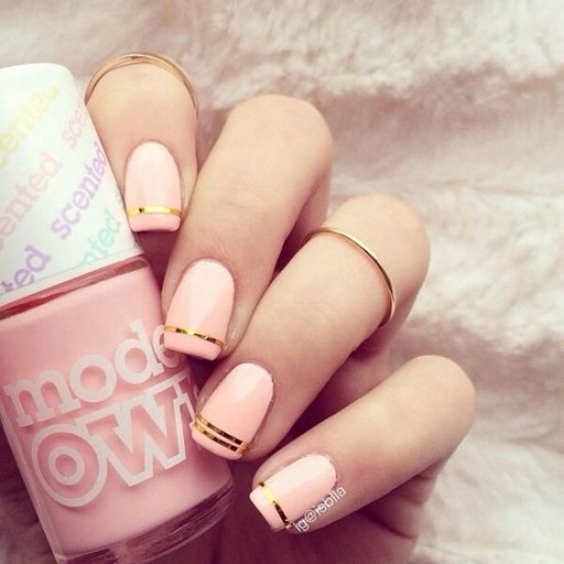 Pink nails examples, the trendiest pink nail colors to use: Gold Stripe Accents