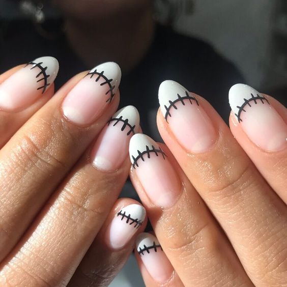 Easy Halloween Nail Tutorial: Spookily Adorable Skulls – YouBeauty