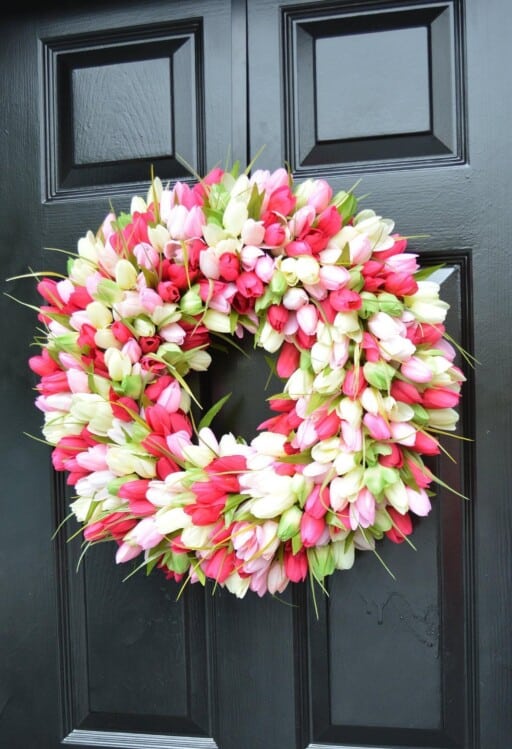 Handcrafted Tulip Spring Wreath: Unique floral design for a charming entryway accent.