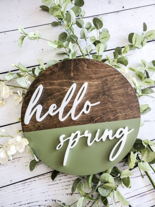 Spring Door Decor: Refresh your entryway with a beautiful wooden spring sign.