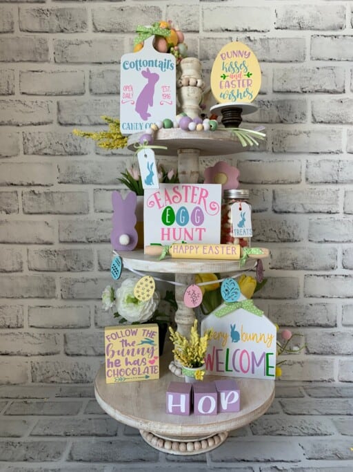 Creative Easter Decor Idea: Two-tier tray filled with colorful Easter decorations. Inspire your spring decorating!
