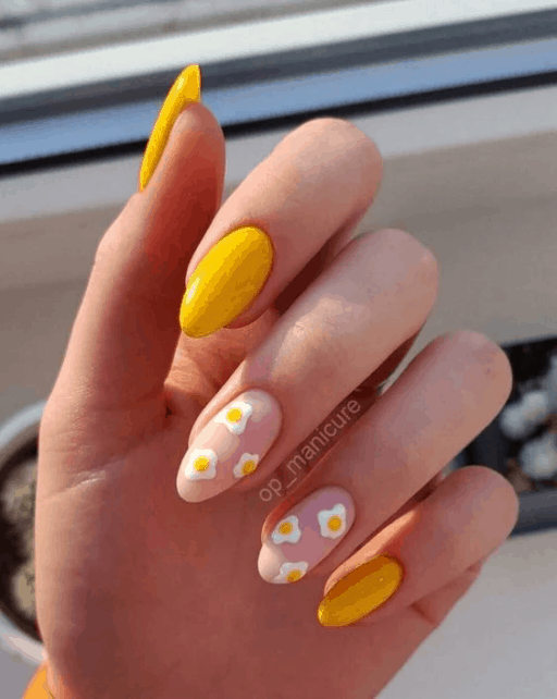Trendy yellow nail designs for a sunny manicure: Bright Flower Accent