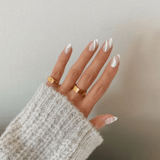 Abstract nail art to inspire your next manicure: White & Nude Swirls