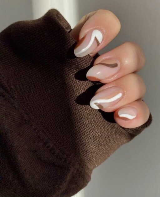 Abstract nail art to inspire your next manicure: Neutral Swirls