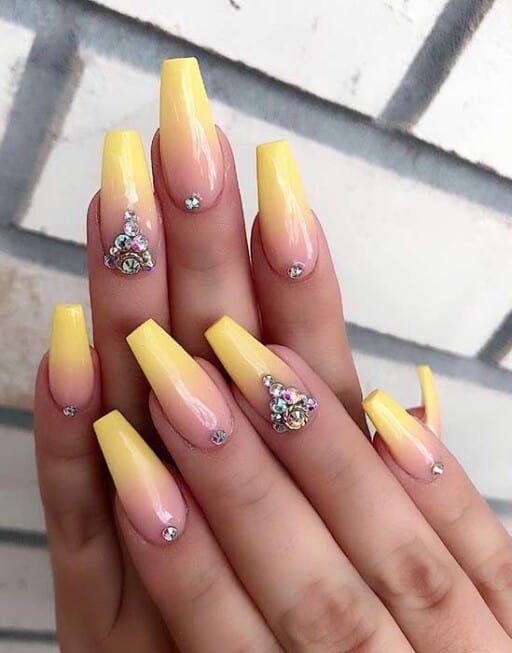 Trendy yellow nail designs for a sunny manicure: Ombre With Bling