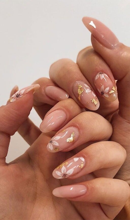 delicate and abstract flower nail art designs: Soft Tropical Flowers With Gold