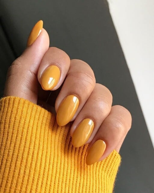 Trendy yellow nail designs for a sunny manicure: Deep Mustard