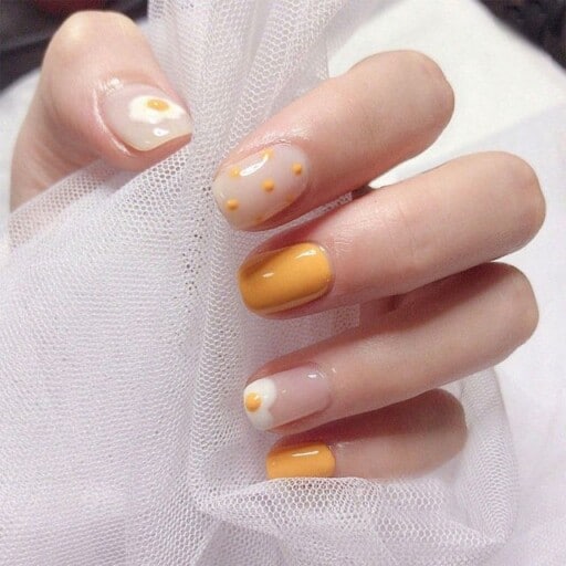 delicate and abstract flower nail art designs: Yellow With Clear Flowers
