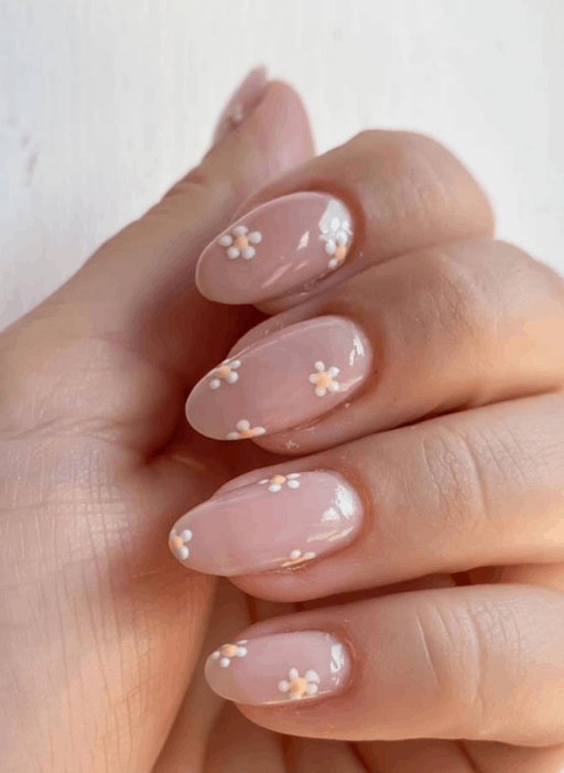 delicate and abstract flower nail art designs: Nude With Small Daisies