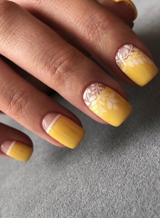 Trendy yellow nail designs for a sunny manicure: Delicate Leaf Design