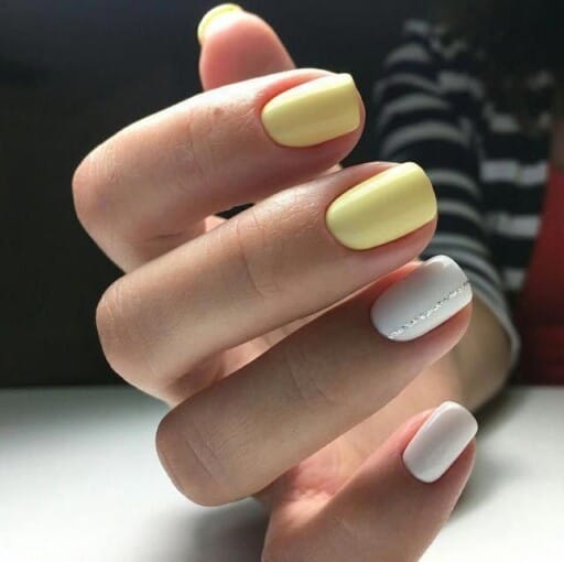 Trendy yellow nail designs for a sunny manicure: Yellow & White