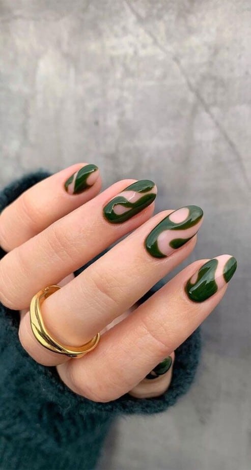 Abstract nail art to inspire your next manicure: Deep Green Swirls