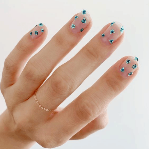 delicate and abstract flower nail art designs: Clear With Blue Flower Designs