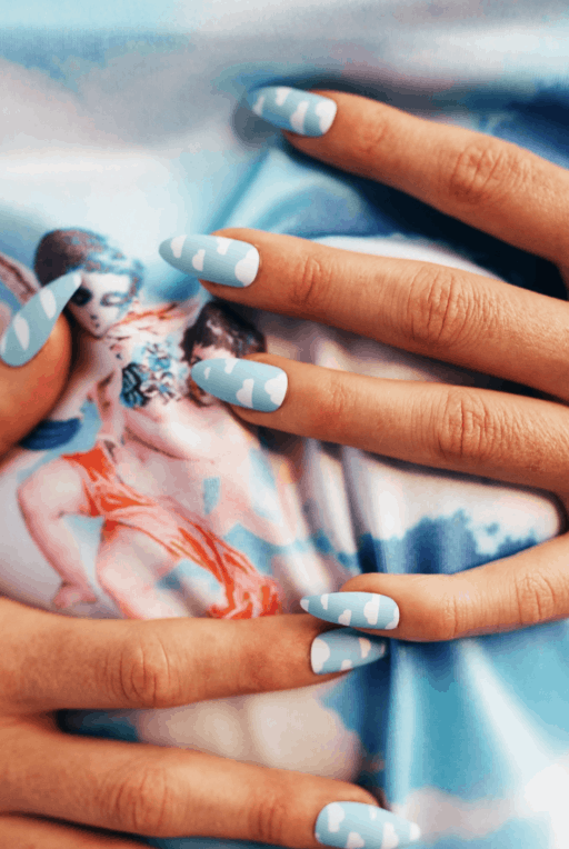 Beautiful cloud nail art and designs for a dreamy manicure: Bright Blue Cloud Nails