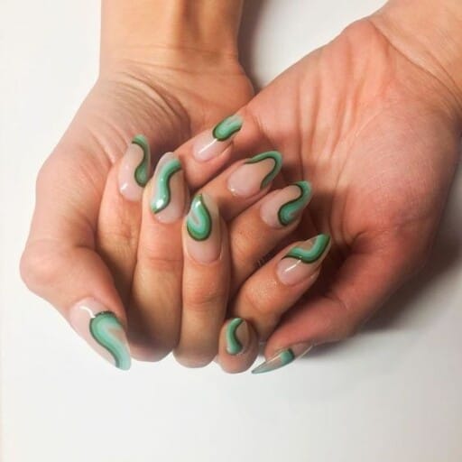 Abstract nail art to inspire your next manicure: Green Swirls