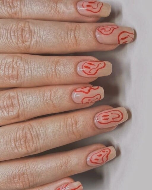 Abstract nail art to inspire your next manicure: Red Face Design