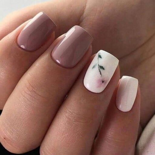 delicate and abstract flower nail art designs: White Flower Accent Nail