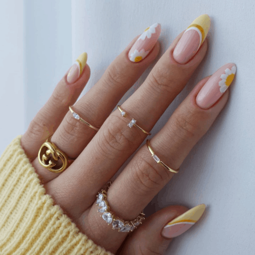 delicate and abstract flower nail art designs: Clear With Yellow Tips & Daisy Accents