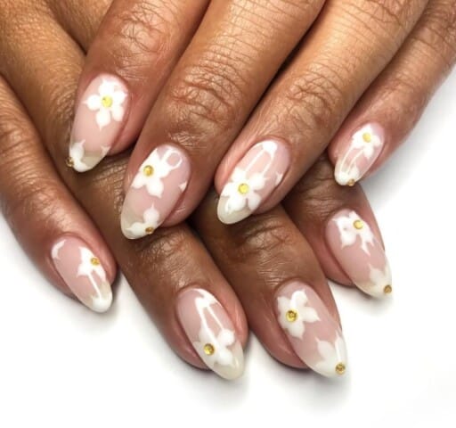 delicate and abstract flower nail art designs: White Flowers With Gems