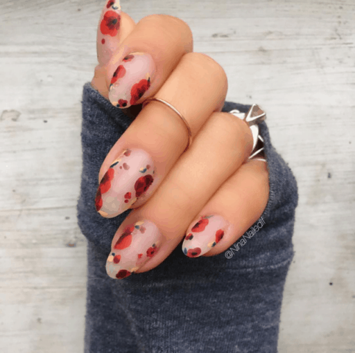 delicate and abstract flower nail art designs: Red Flowers On Matte Nails