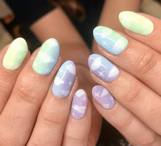 Beautiful cloud nail art and designs for a dreamy manicure: Blue, Green, and Purple Cloud Nails