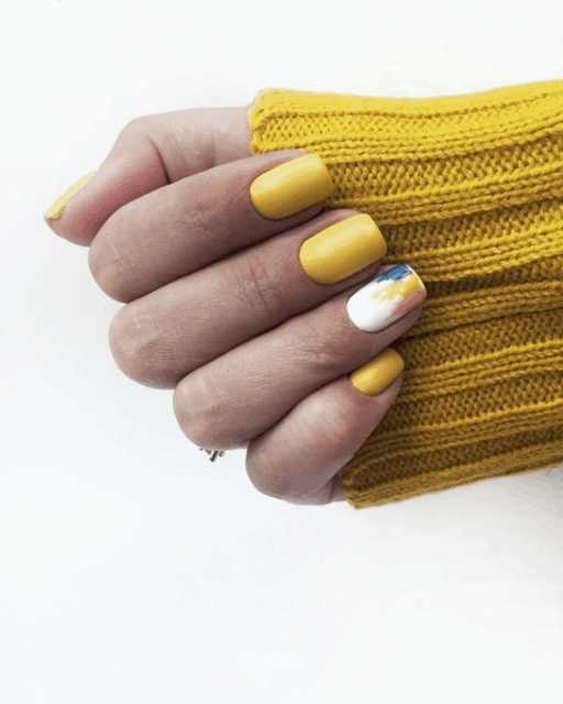 Trendy yellow nail designs for a sunny manicure: Watercolor Abstract Accent
