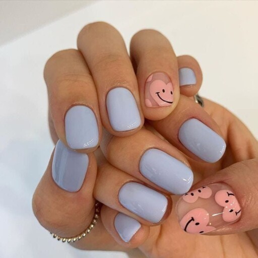 Short nail design ideas for a trendy manicure: Smiley Face Accent