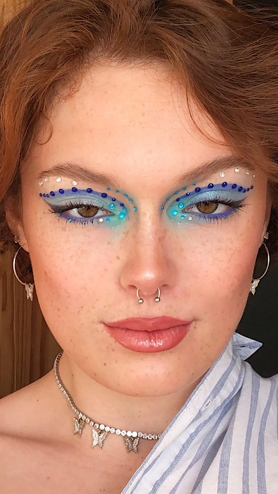 Festival makeup and festival looks, including festival glitter makeup, Coachella makeup, and more