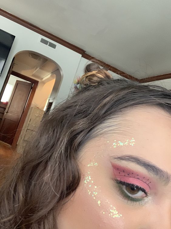 Festival makeup and festival looks, including festival glitter makeup, Coachella makeup, and more