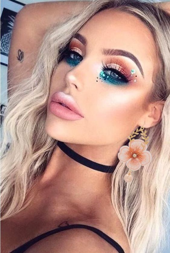 Festival makeup and festival looks, including festival glitter makeup, Coachella makeup, and more