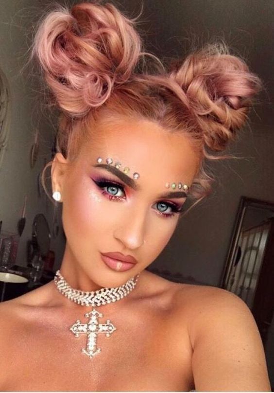 Festival makeup and festival looks, including festival glitter makeup, Coachella makeup, and more