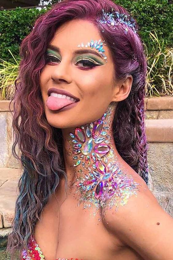 Festival makeup and festival looks, including festival glitter makeup, Coachella makeup, and more