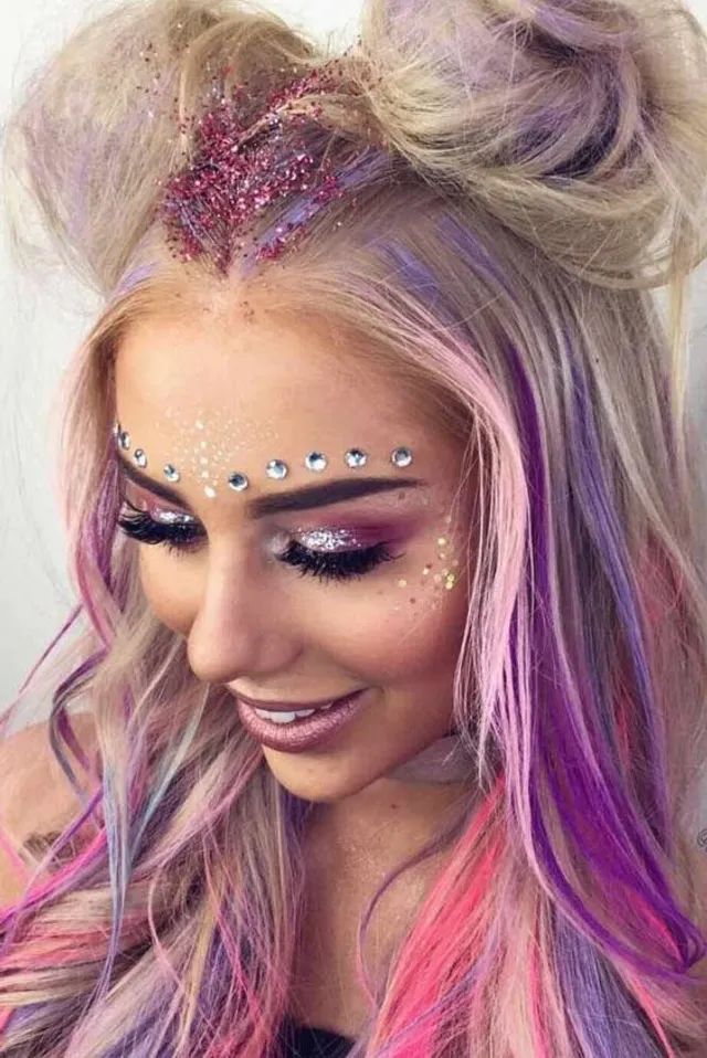 Festival makeup and festival looks, including festival glitter makeup, Coachella makeup, and more