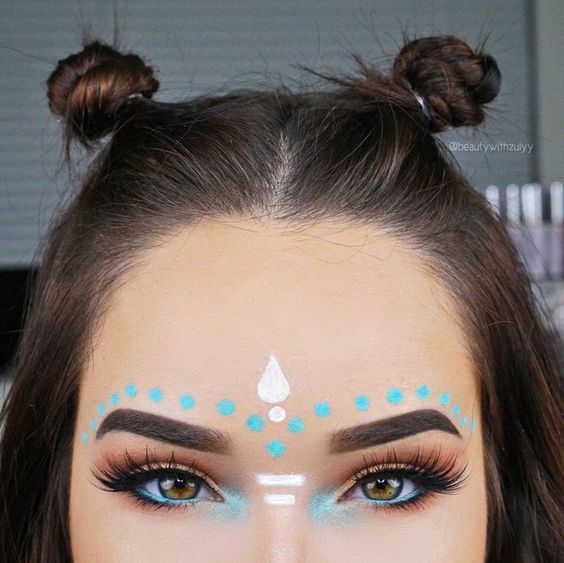 Festival makeup and festival looks, including festival glitter makeup, Coachella makeup, and more