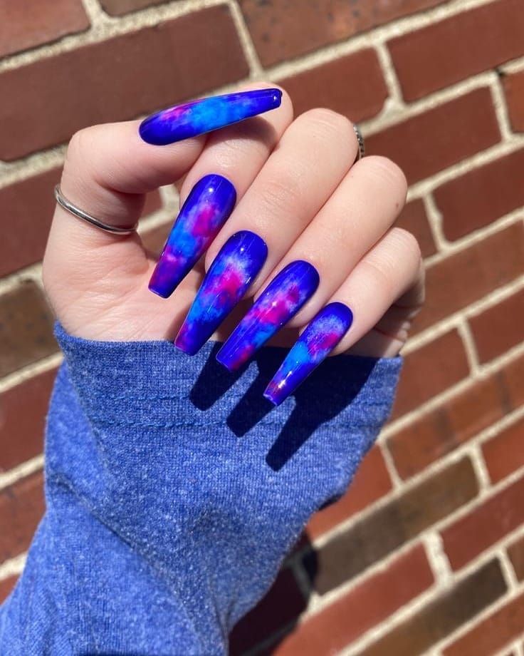 Galaxy nails, galaxy nail designs, and galaxy nail art for a gorgeous manicure