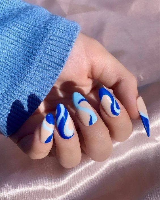 The top blue nails and blue nail ideas including light blue nails, blue acrylic nails, blue nail designs, blue nail art, trendy blue nails, royal blue nails, and short blue nails