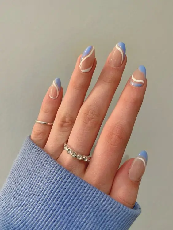 Light Blue Nail Art With Flowers On White Textile Stock Photo - Download  Image Now - Nail Art, Short - Length, Fingernail - iStock