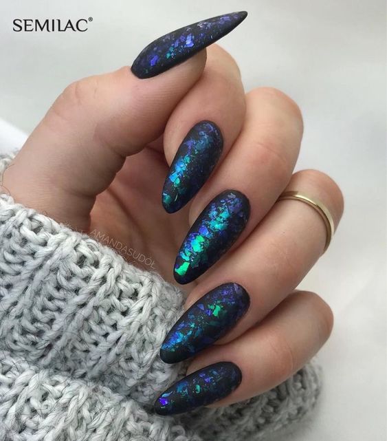 Galaxy nails, galaxy nail designs, and galaxy nail art for a gorgeous manicure