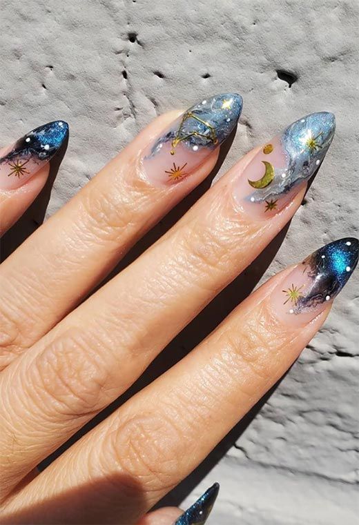 Galaxy nails, galaxy nail designs, and galaxy nail art for a gorgeous manicure