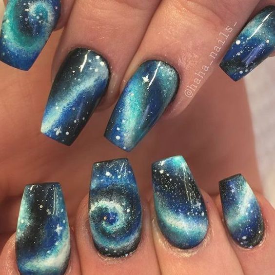 Galaxy nails, galaxy nail designs, and galaxy nail art for a gorgeous manicure