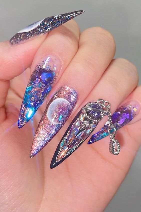 Galaxy nails, galaxy nail designs, and galaxy nail art for a gorgeous manicure