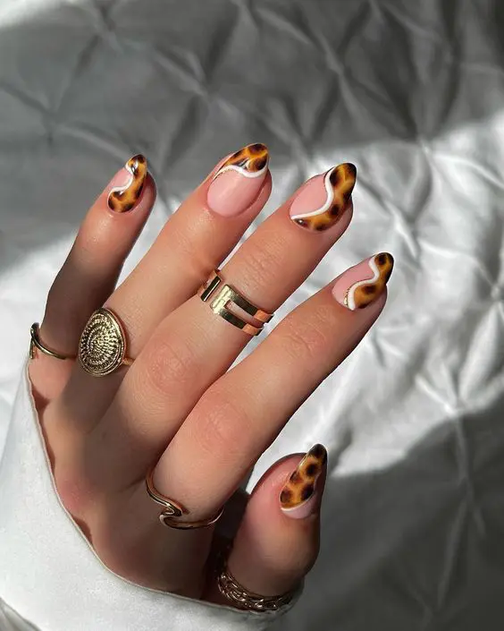 The top leopard nails, leopard print nails, cheetah print nails, cheetah nails, and animal print nails in general