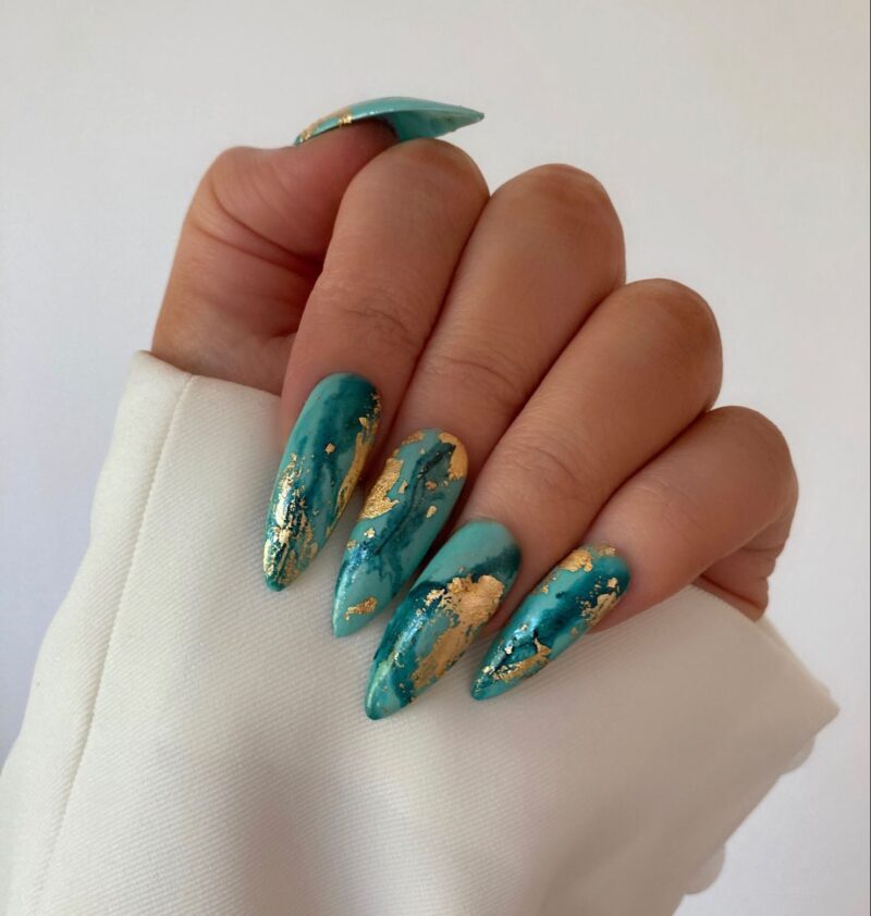 teal and gold nails