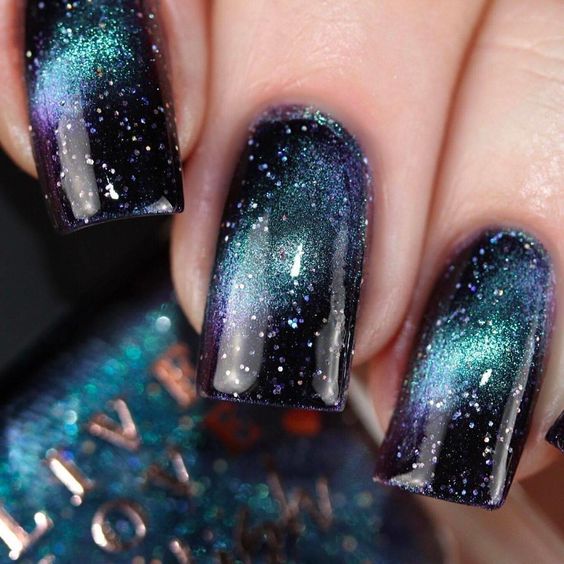 Galaxy nails, galaxy nail designs, and galaxy nail art for a gorgeous manicure