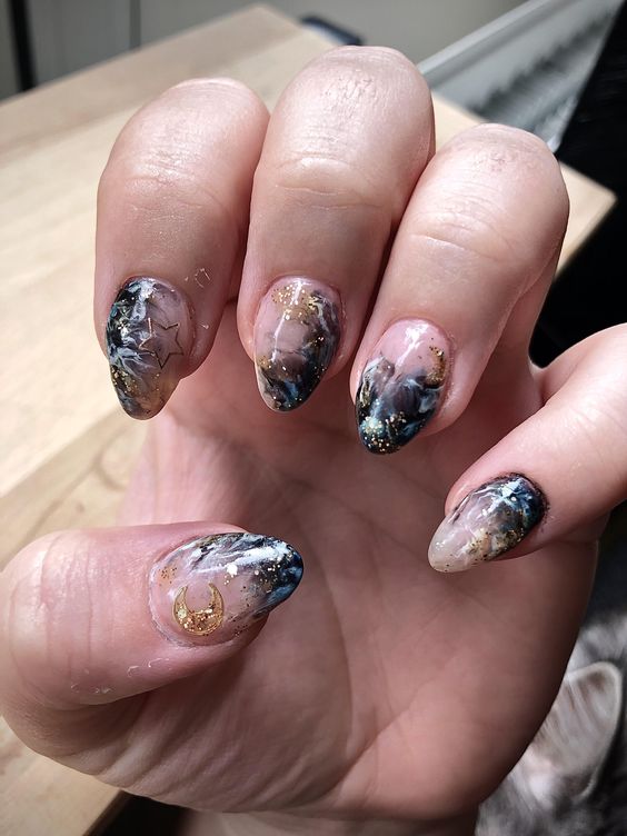 Galaxy nails, galaxy nail designs, and galaxy nail art for a gorgeous manicure