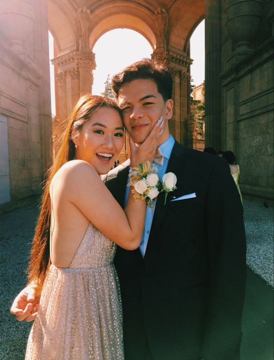 The coolest prom poses to copy for this prom season, including prom poses for couples, prom poses for friends, and solo prom poses for photos/pictures