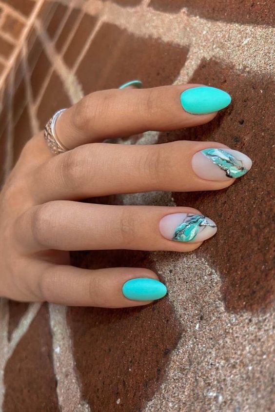 The top turquoise nails and teal nails right now