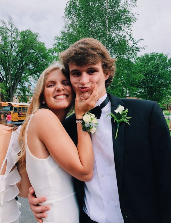 The coolest prom poses to copy for this prom season, including prom poses for couples, prom poses for friends, and solo prom poses for photos/pictures