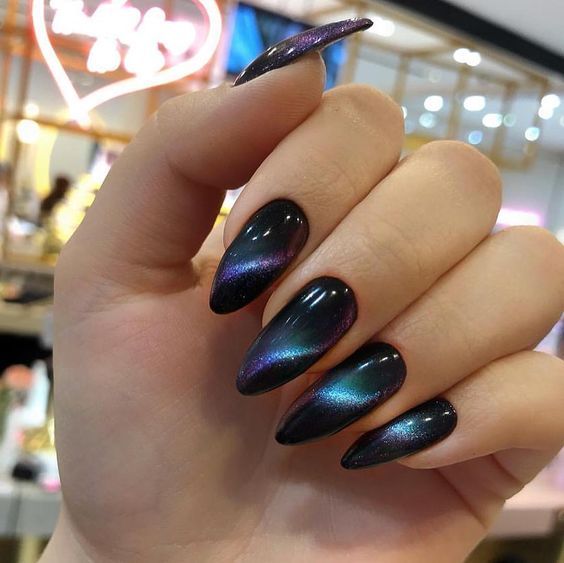 The hottest trend right now: cat eye nails including the classic cat eye nails design and interesting cat eye nail ideas